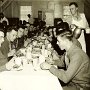 Pre-embarkation Party.<br />Recognizable - Moore, Glenn, Nasenbeny, Beecher, Schutzman w/krawczyk as waiter. 